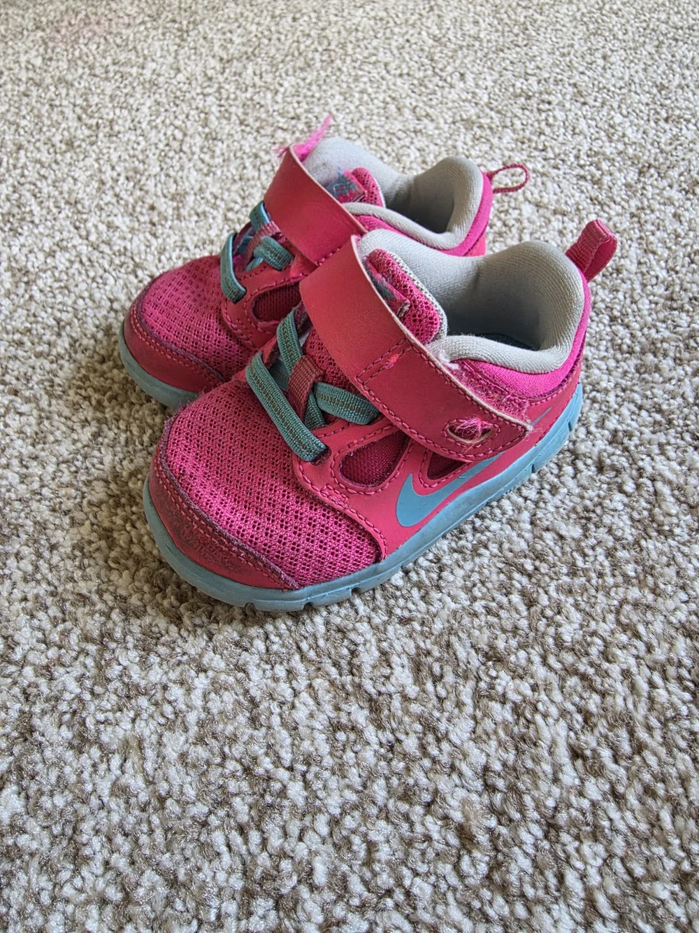 Nike Kids' Pink Athletic Sneakers with Teal Accents